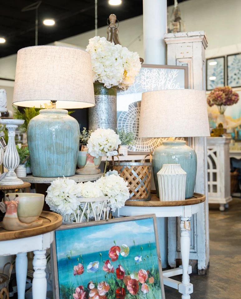 Lamps, floral decor and artwork displayed inside Painted Tree